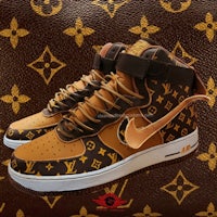 a pair of louis vuitton force 1 high sneakers on a brown background